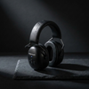 Premium hero: CE certified Bluetooth 5.0 electronic ear defenders on dark stone