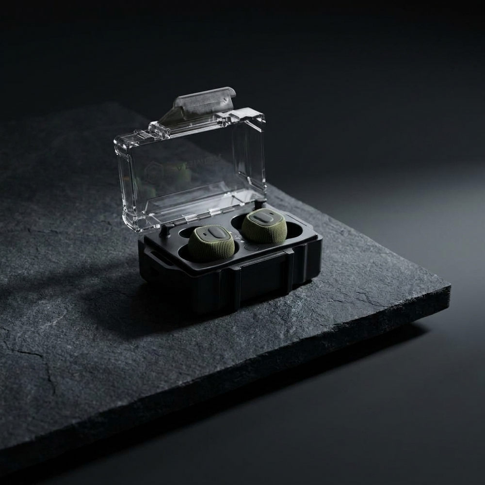 Premium hero: M20 NRR22 electronic earbuds with charging case on dark stone